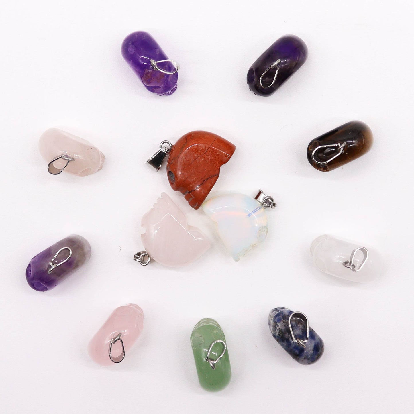 12 x Colgantes Mini Calaveras - 20x15mm