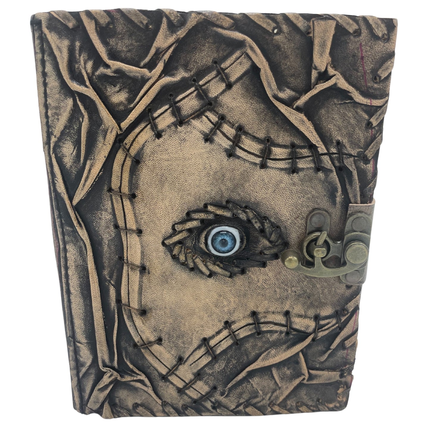 Carnet marron avec bords usés et motif mauvais œil