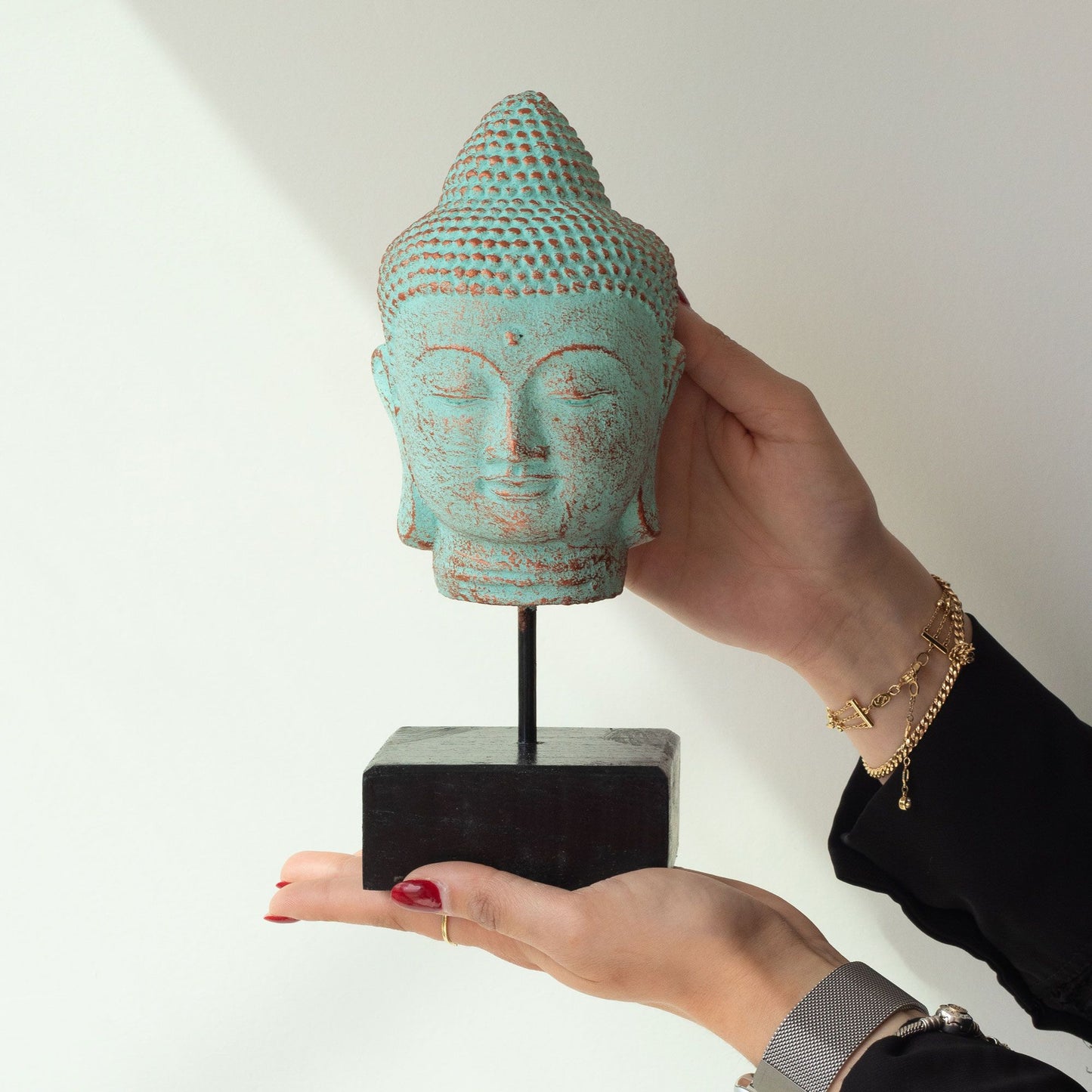 Tête de Bouddha allongée sur un support - Cuivre vert