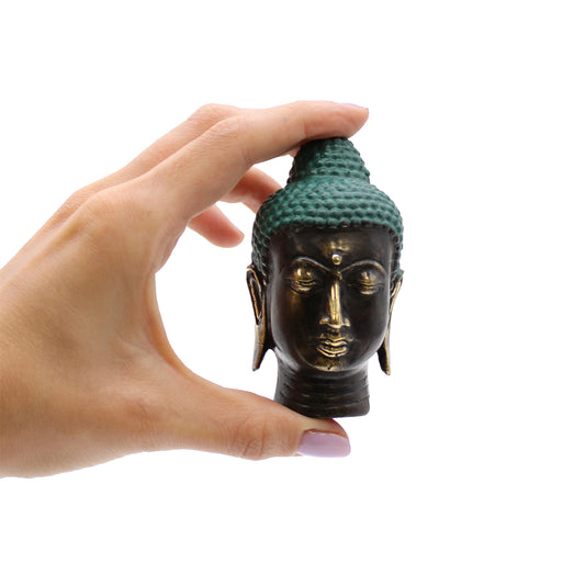 Petite tête de Bouddha en laiton antique