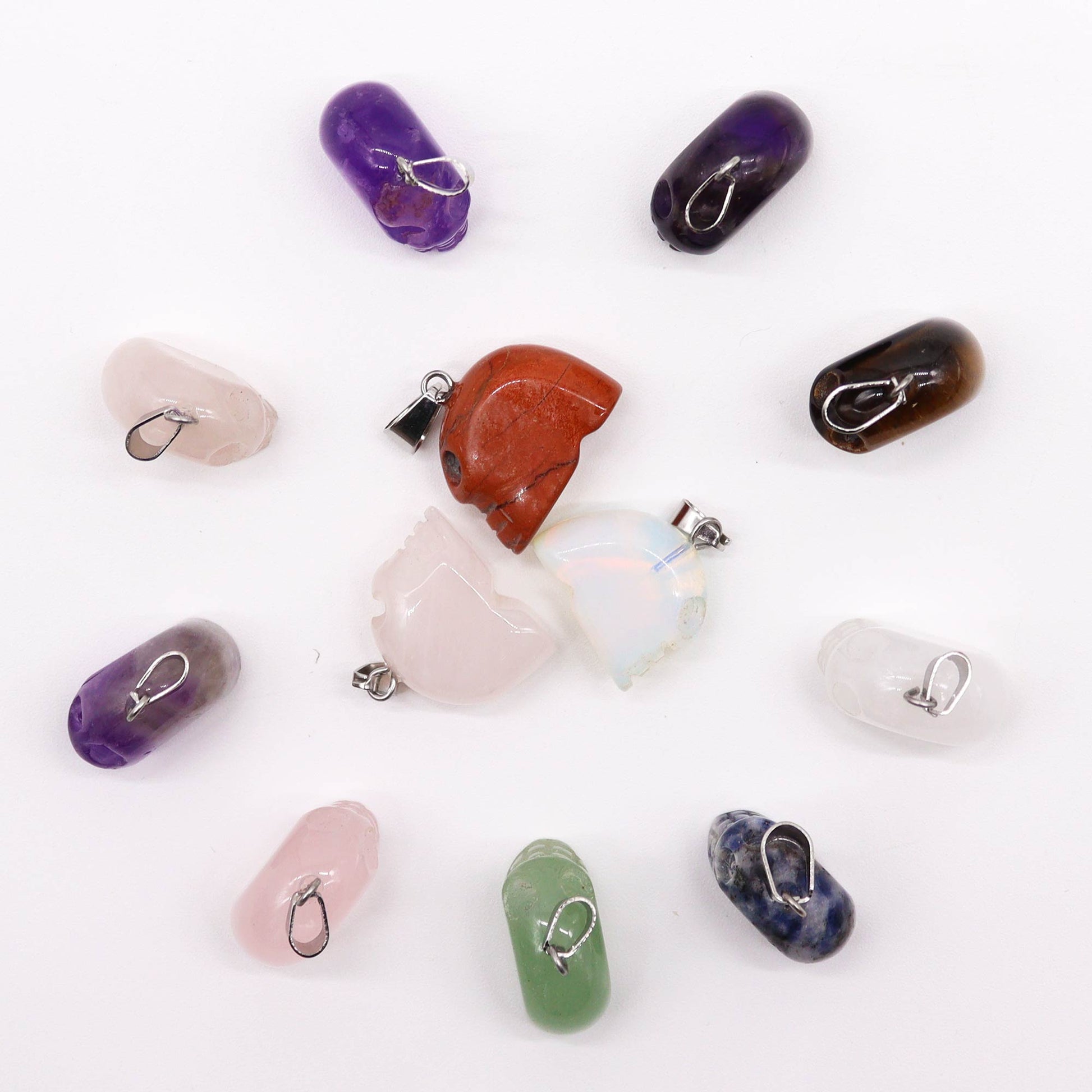 12 x Colgantes Mini Calaveras - 20x15mm